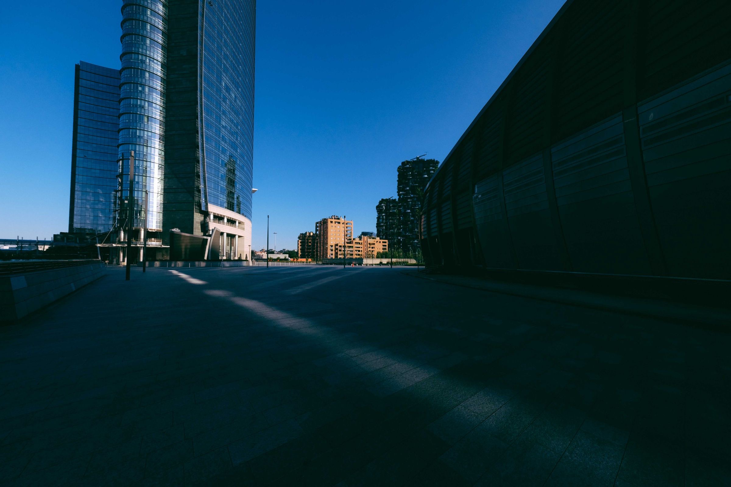 A street in Milan's Porta Nuova district on a clear day