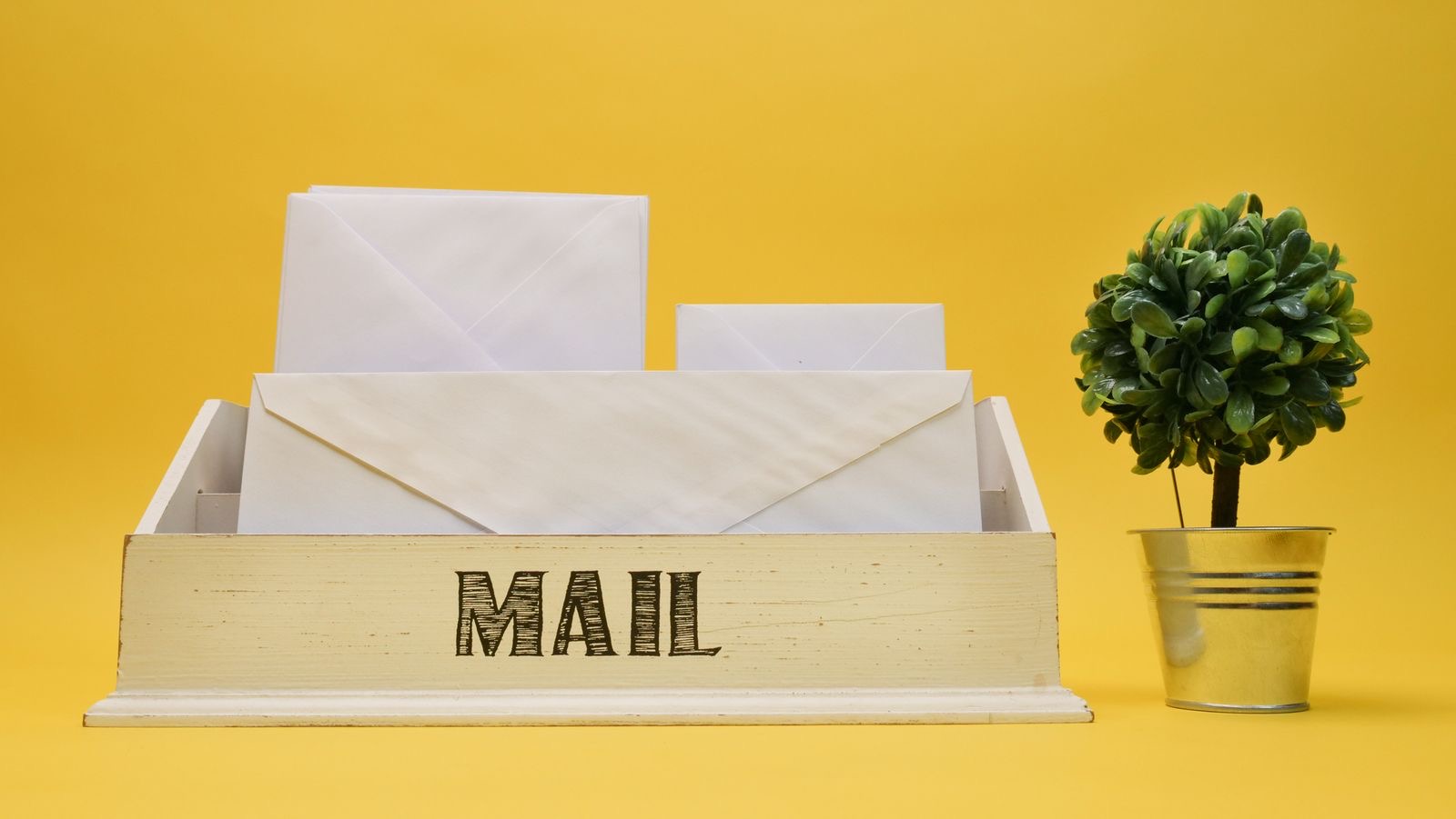 An envelope on a post-office counter