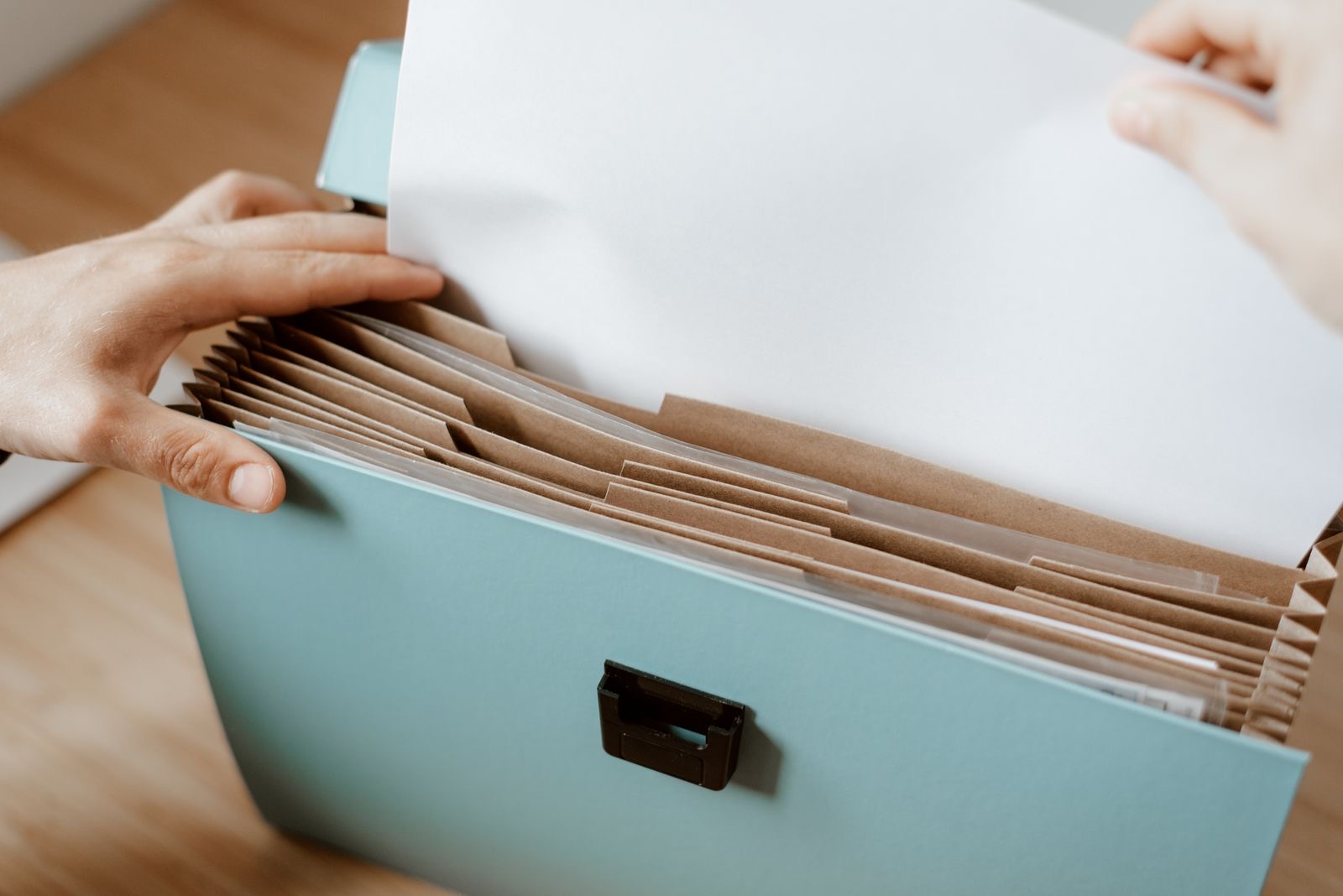 A folder of paperwork on a reception counter